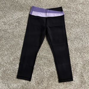 Lululemon cropped legging, dark gray with purple top accent, size 4